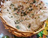 A picture of step 17 of Garlic naan on tawa.
