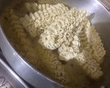 A picture of step 1 of Night hunger Egg Maggi masala.