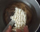 A picture of step 3 of Maggi manchow soup.
