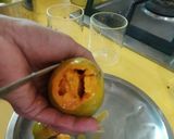 A picture of step 2 of Ice cream loaded mango.