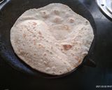 A picture of step 2 of Onion  Roti.