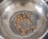 A picture of step 2 of Neem flower rasam.