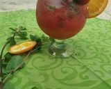 A picture of step 1 of Strawberry orange punch.