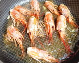 Foto del paso 2 de la receta: Arroz meloso de chipirones y gambón