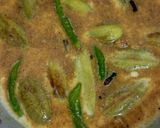A picture of step 7 of Dudh potol (pointed gourd in milky gravy).