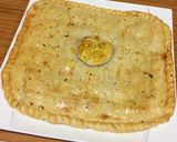 Foto del paso 5 de la receta: Empanada de Mandarina en almíbar-Bacon-Queso y toque de jengibre