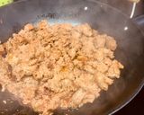 A picture of step 4 of Chilorio de Longaniza.