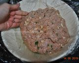 A picture of step 5 of Giant Spaghetti Stuffed Meatball.