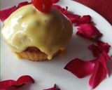 A picture of step 6 of Eggless mawa cup cake topping with shrikhand.