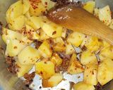 A picture of step 6 of Masala Fried Curried Potatoes.