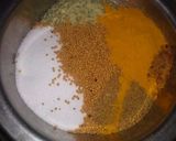 A picture of step 2 of Stuffed red chilli pickle.