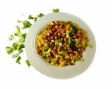 A picture of step 4 of Upma with puffed rice and colorful veggies.