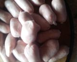 A picture of step 7 of Roast Chicken with stuffing and very fat pigs in blankets.