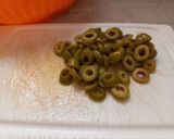 A picture of step 2 of Chickpea Salad with Tomatoes, Olives, Parmesan, and Fennel.