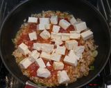 A picture of step 3 of Tomato Mapo Doufu with Minced Chicken.