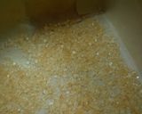 A picture of step 9 of Castella Cake in a Newspaper Mold.