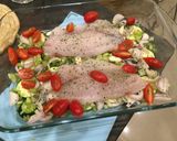 A picture of step 5 of Paloma's Baked Tilapia with Celery, Courgette, Spinach in white.