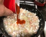 Foto del paso 8 de la receta: Crepes rellenos de picada de pescado y marisco con salsa al cava