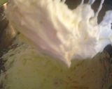 A picture of step 5 of sunshines cranberries buttercream cake.