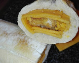 Foto del paso 3 de la receta: Barra rellena de pechuga queso gratinada con ajo perejil y cuatro quesos