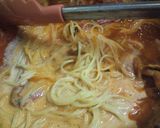 A picture of step 9 of Blue Crab & Tomato Cream Pasta.