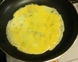 A picture of step 2 of Simple Thick & Fluffy Omelette.