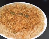 A picture of step 3 of American chop suey with fried rice.