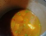 A picture of step 3 of Peas & Tomato Biryani.
