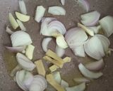 A picture of step 2 of Bharwa bhindi in dahi kadi.