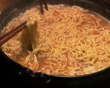 A picture of step 10 of Miso Motsu Nabe (Hakata Specialty).