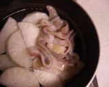 A picture of step 3 of Boiled Daikon with Squid.