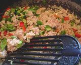 A picture of step 8 of Stir Fried Chicken and Basil over Rice.