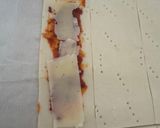 A picture of step 4 of Puff Pastry Twists with 'Nduja Spread, Speck, and Ragusano Cheese.