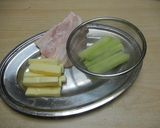A picture of step 2 of Bacon Wrapped Broccoli Stems.