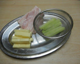 A picture of step 2 of Bacon Wrapped Broccoli Stems.