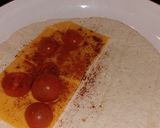 A picture of step 1 of My cheese and cherry tomato quesadilla.