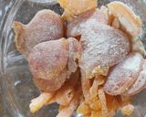 A picture of step 13 of Orange candies in two varieties.