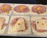 A picture of step 3 of Ham and cheese spicy egg rolls.