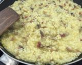 Foto del paso 10 de la receta Risotto de jamón y champiñones improvisado