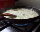 A picture of step 3 of كبه بالصينية kebbeh in pan.