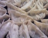 A picture of step 4 of Crisp! Light! Juicy! Supreme Gyoza Pot Stickers.