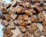 A picture of step 8 of Buttery Garlic Basil Sprouted Wheat Croutons.