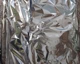 Une image de l'étape 5 de Cuisses de poulet et pomme de terre grillées au four.
