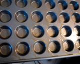 A picture of step 8 of Mini Apple Banana Walnut Bread Muffins.
