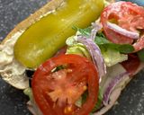 A picture of step 5 of Subway at home/ sub board.