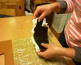 A picture of step 6 of California Rolls.