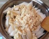A picture of step 8 of Kenchin Simmered Daikon Radish and Firm Tofu.