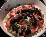 A picture of step 1 of Brauts With Peppers And Onions.