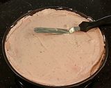 A picture of step 15 of Strawberry Cheesecake Layer Cake.