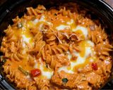 A picture of step 6 of Slow Cooker Creamy Chicken Enchilada Pasta.